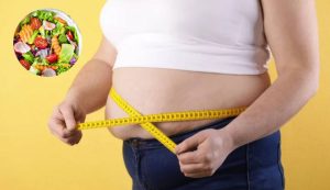 Obesità e insalata (Depositphotos foto)